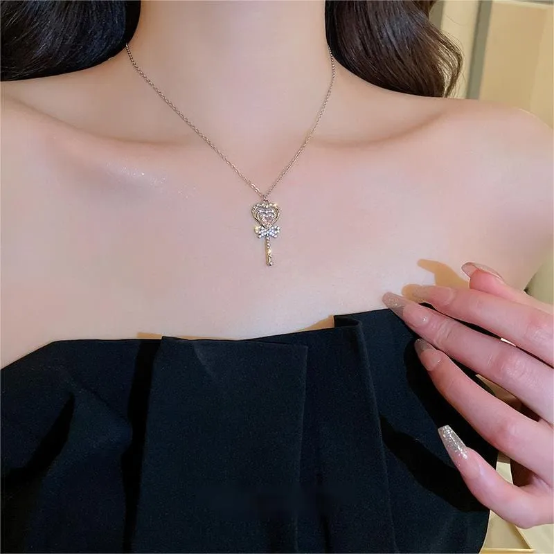 Chic CZ Inlaid Bowknot Heart Magic Wand Necklace