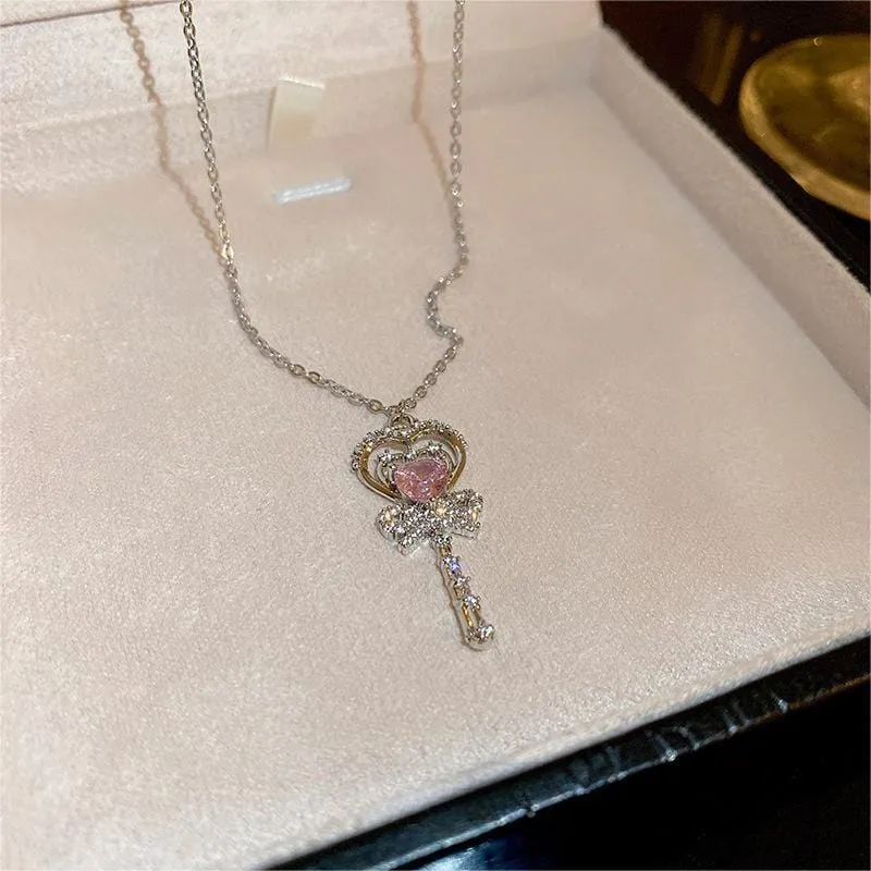 Chic CZ Inlaid Bowknot Heart Magic Wand Necklace